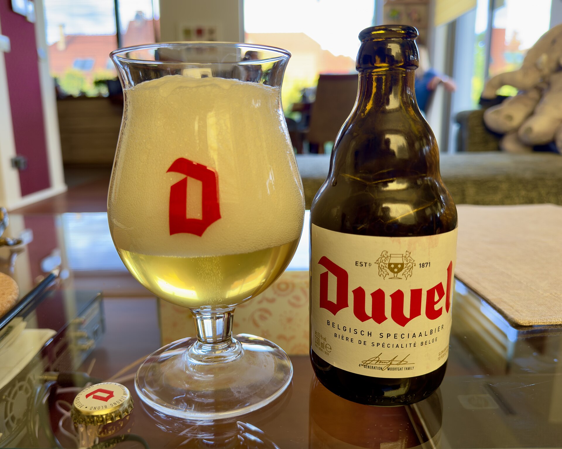 A Duvel poured into its glass