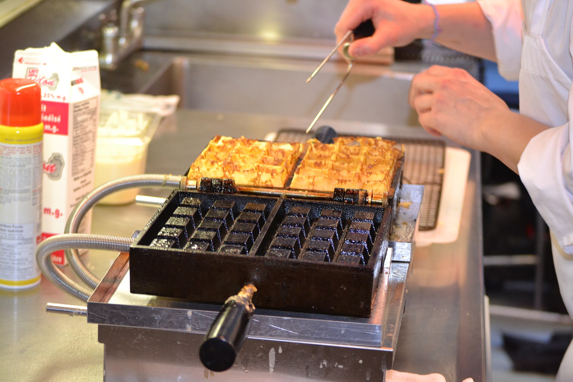 Belgian waffles cooking on the iron