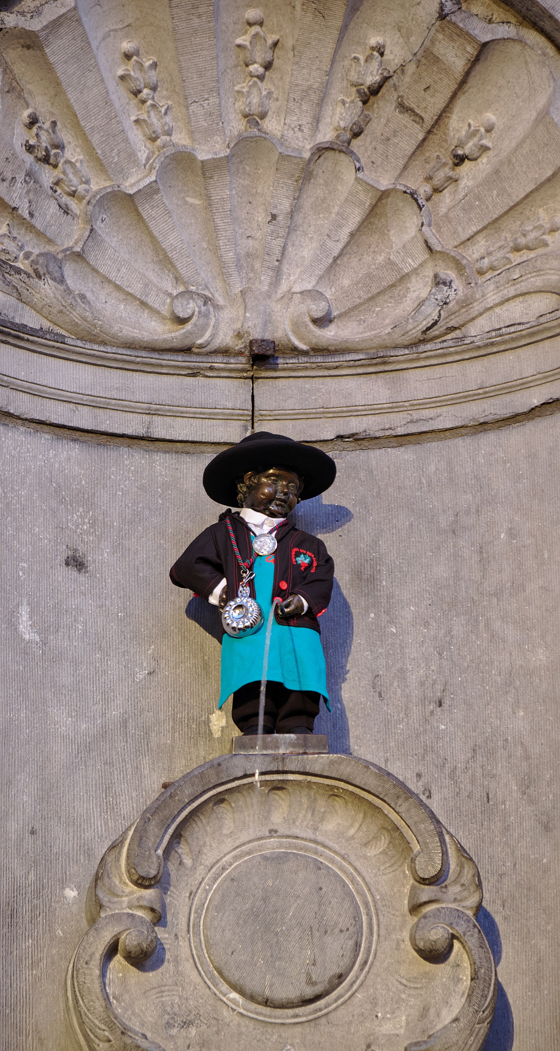 Manneken Pis wearing a costume